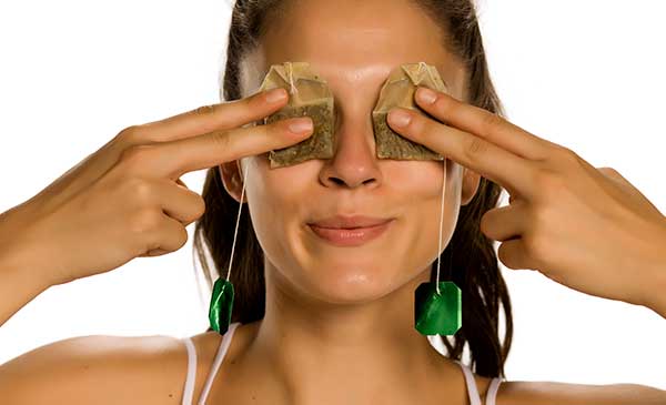 Tea bags on eyes to reduce puffiness and dark circles