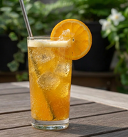 tall glass of citrus turmeric cooler