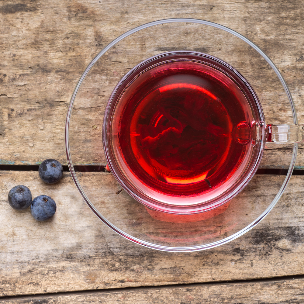 blueberry hibiscus tea in a cup